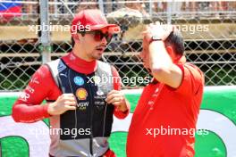 Charles Leclerc (MON) Ferrari with Frederic Vasseur (FRA) Ferrari Team Principal on the grid. 23.06.2024. Formula 1 World Championship, Rd 10, Spanish Grand Prix, Barcelona, Spain, Race Day.