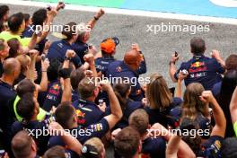 Race winner Max Verstappen (NLD) Red Bull Racing celebrates with the team. 23.06.2024. Formula 1 World Championship, Rd 10, Spanish Grand Prix, Barcelona, Spain, Race Day.