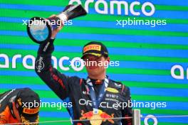 Race winner Max Verstappen (NLD) Red Bull Racing celebrates on the podium. 23.06.2024. Formula 1 World Championship, Rd 10, Spanish Grand Prix, Barcelona, Spain, Race Day.