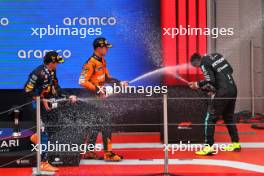 The podium (L to R): Lando Norris (GBR) McLaren, second; Max Verstappen (NLD) Red Bull Racing, race winner; Lewis Hamilton (GBR) Mercedes AMG F1, third. 23.06.2024. Formula 1 World Championship, Rd 10, Spanish Grand Prix, Barcelona, Spain, Race Day.