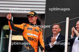 Lando Norris (GBR) McLaren celebrates his second position on the podium. 23.06.2024. Formula 1 World Championship, Rd 10, Spanish Grand Prix, Barcelona, Spain, Race Day.