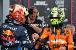 (L to R): Race winner Max Verstappen (NLD) Red Bull Racing celebrates in parc ferme with second placed Lando Norris (GBR) McLaren. 23.06.2024. Formula 1 World Championship, Rd 10, Spanish Grand Prix, Barcelona, Spain, Race Day.
