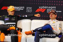 (L to R): Lando Norris (GBR) McLaren and Max Verstappen (NLD) Red Bull Racing in the post race FIA Press Conference. 23.06.2024. Formula 1 World Championship, Rd 10, Spanish Grand Prix, Barcelona, Spain, Race Day.