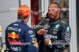 (L to R): Race winner Max Verstappen (NLD) Red Bull Racing with third placed Lewis Hamilton (GBR) Mercedes AMG F1 in parc ferme. 23.06.2024. Formula 1 World Championship, Rd 10, Spanish Grand Prix, Barcelona, Spain, Race Day.