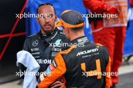 (L to R): Third placed Lewis Hamilton (GBR) Mercedes AMG F1 with second placed Lando Norris (GBR) McLaren in parc ferme. 23.06.2024. Formula 1 World Championship, Rd 10, Spanish Grand Prix, Barcelona, Spain, Race Day.