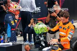 (L to R): race winner Max Verstappen (NLD) Red Bull Racing and second placed Lando Norris (GBR) McLaren in parc ferme. 23.06.2024. Formula 1 World Championship, Rd 10, Spanish Grand Prix, Barcelona, Spain, Race Day.