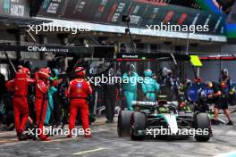 Lewis Hamilton (GBR) Mercedes AMG F1 W15 makes a pit stop. 23.06.2024. Formula 1 World Championship, Rd 10, Spanish Grand Prix, Barcelona, Spain, Race Day.