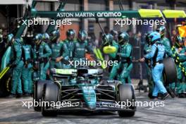 Lance Stroll (CDN) Aston Martin F1 Team AMR24 makes a pit stop. 23.06.2024. Formula 1 World Championship, Rd 10, Spanish Grand Prix, Barcelona, Spain, Race Day.