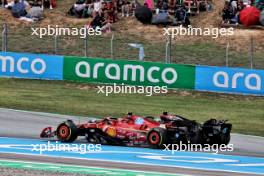Lewis Hamilton (GBR) Mercedes AMG F1 W15 and George Russell (GBR) Mercedes AMG F1 W15 battle for position. 23.06.2024. Formula 1 World Championship, Rd 10, Spanish Grand Prix, Barcelona, Spain, Race Day.