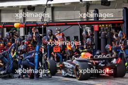 Sergio Perez (MEX) Red Bull Racing RB20 makes a pit stop. 23.06.2024. Formula 1 World Championship, Rd 10, Spanish Grand Prix, Barcelona, Spain, Race Day.