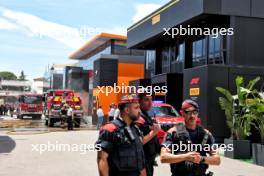 Fire fighters attend the fire in the McLaren motorhome in the paddock. 22.06.2024. Formula 1 World Championship, Rd 10, Spanish Grand Prix, Barcelona, Spain, Qualifying Day.
