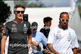 (L to R): George Russell (GBR) Mercedes AMG F1 with Lewis Hamilton (GBR) Mercedes AMG F1. 22.06.2024. Formula 1 World Championship, Rd 10, Spanish Grand Prix, Barcelona, Spain, Qualifying Day.