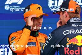 (L to R): Pole sitter Lando Norris (GBR) McLaren with Max Verstappen (NLD) Red Bull Racing in qualifying parc ferme. 22.06.2024. Formula 1 World Championship, Rd 10, Spanish Grand Prix, Barcelona, Spain, Qualifying Day.