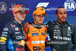The top three in qualifying parc ferme (L to R): Max Verstappen (NLD) Red Bull Racing, second; Lando Norris (GBR) McLaren, pole position; Lewis Hamilton (GBR) Mercedes AMG F1, third. 22.06.2024. Formula 1 World Championship, Rd 10, Spanish Grand Prix, Barcelona, Spain, Qualifying Day.
