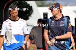 (L to R): Daniel Ricciardo (AUS) RB with Max Verstappen (NLD) Red Bull Racing. 22.06.2024. Formula 1 World Championship, Rd 10, Spanish Grand Prix, Barcelona, Spain, Qualifying Day.