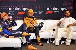 (L to R): Max Verstappen (NLD) Red Bull Racing; Lando Norris (GBR) McLaren; and Lewis Hamilton (GBR) Mercedes AMG F1, in the post qualifying FIA Press Conference. 22.06.2024. Formula 1 World Championship, Rd 10, Spanish Grand Prix, Barcelona, Spain, Qualifying Day.