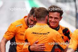 Lando Norris (GBR) McLaren celebrates his pole position in qualifying parc ferme with the team. 22.06.2024. Formula 1 World Championship, Rd 10, Spanish Grand Prix, Barcelona, Spain, Qualifying Day.