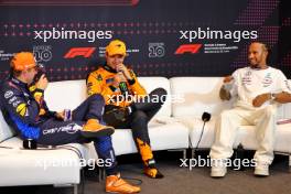 (L to R): Max Verstappen (NLD) Red Bull Racing; Lando Norris (GBR) McLaren; and Lewis Hamilton (GBR) Mercedes AMG F1, in the post qualifying FIA Press Conference. 22.06.2024. Formula 1 World Championship, Rd 10, Spanish Grand Prix, Barcelona, Spain, Qualifying Day.