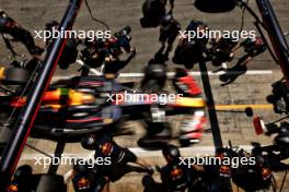 Sergio Perez (MEX) Red Bull Racing RB20 practices a pit stop. 22.06.2024. Formula 1 World Championship, Rd 10, Spanish Grand Prix, Barcelona, Spain, Qualifying Day.