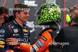 (L to R): Max Verstappen (NLD) Red Bull Racing with pole sitter Lando Norris (GBR) McLaren in qualifying parc ferme. 22.06.2024. Formula 1 World Championship, Rd 10, Spanish Grand Prix, Barcelona, Spain, Qualifying Day.