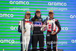 The podium (L to R): Nerea Marti (ESP) Campos Racing, second; Abbi Pulling (GBR) Rodin Motorsport, race winner; Chloe Chambers (USA) Campos Racing, third. 22.06.2024. FIA Formula Academy, Rd 3, Race 1, Barcelona, Spain, Saturday.