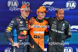 The top three in qualifying parc ferme (L to R): Max Verstappen (NLD) Red Bull Racing, second; Lando Norris (GBR) McLaren, pole position; Lewis Hamilton (GBR) Mercedes AMG F1, third. 22.06.2024. Formula 1 World Championship, Rd 10, Spanish Grand Prix, Barcelona, Spain, Qualifying Day.