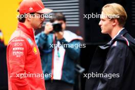 (L to R): Charles Leclerc (MON) Ferrari with Mick Schumacher (GER) Mercedes AMG F1 Reserve Driver. 20.06.2024. Formula 1 World Championship, Rd 10, Spanish Grand Prix, Barcelona, Spain, Preparation Day.