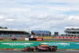 Lewis Hamilton (GBR) Mercedes AMG F1 W15 and Max Verstappen (NLD) Red Bull Racing RB20. 05.07.2024. Formula 1 World Championship, Rd 12, British Grand Prix, Silverstone, England, Practice Day.