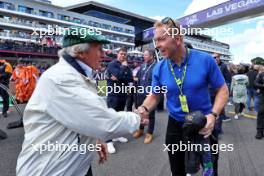 (L to R): Jackie Stewart (GBR) with Sir Chris Hoy (GBR) on the grid. 07.07.2024. Formula 1 World Championship, Rd 12, British Grand Prix, Silverstone, England, Race Day.