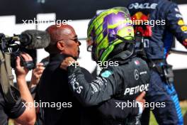 Race winner Lewis Hamilton (GBR) Mercedes AMG F1 celebrates in parc ferme with his father Anthony Hamilton (GBR). 07.07.2024. Formula 1 World Championship, Rd 12, British Grand Prix, Silverstone, England, Race Day.