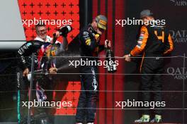 Max Verstappen (NLD) Red Bull Racing, second; Peter Bonnington (GBR) Mercedes AMG F1 Race Engineer; Lewis Hamilton (GBR) Mercedes AMG F1, race winner; Lando Norris (GBR) McLaren, third. 07.07.2024. Formula 1 World Championship, Rd 12, British Grand Prix, Silverstone, England, Race Day.