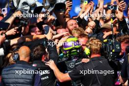 Race winner Lewis Hamilton (GBR) Mercedes AMG F1 celebrates in parc ferme with the team. 07.07.2024. Formula 1 World Championship, Rd 12, British Grand Prix, Silverstone, England, Race Day.