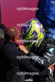 Race winner Lewis Hamilton (GBR) Mercedes AMG F1 celebrates in parc ferme with his father Anthony Hamilton (GBR). 07.07.2024. Formula 1 World Championship, Rd 12, British Grand Prix, Silverstone, England, Race Day.