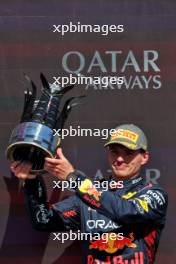 Max Verstappen (NLD) Red Bull Racing celebrates his second position on the podium. 07.07.2024. Formula 1 World Championship, Rd 12, British Grand Prix, Silverstone, England, Race Day.