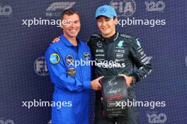George Russell (GBR) Mercedes AMG F1 (Right) receives the Pirelli Pole Position Award from Marcus Wandt (SWE) European Space Agency. 06.07.2024. Formula 1 World Championship, Rd 12, British Grand Prix, Silverstone, England, Qualifying Day.