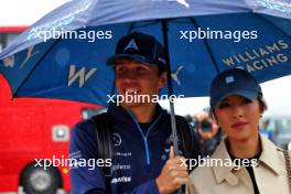 (L to R): Alexander Albon (THA) Williams Racing with his girlfriend Muni Lily He (CHN) Professional Golfer. 06.07.2024. Formula 1 World Championship, Rd 12, British Grand Prix, Silverstone, England, Qualifying Day.