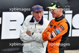 (L to R): Jackie Stewart (GBR) with Lando Norris (GBR) McLaren in qualifying parc ferme. 06.07.2024. Formula 1 World Championship, Rd 12, British Grand Prix, Silverstone, England, Qualifying Day.