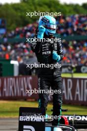 George Russell (GBR) Mercedes AMG F1 W15 celebrates his pole position in qualifying parc ferme. 06.07.2024. Formula 1 World Championship, Rd 12, British Grand Prix, Silverstone, England, Qualifying Day.