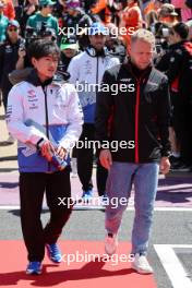 (L to R): Yuki Tsunoda (JPN) RB and Kevin Magnussen (DEN) Haas F1 Team on the drivers' parade. 07.07.2024. Formula 1 World Championship, Rd 12, British Grand Prix, Silverstone, England, Race Day.