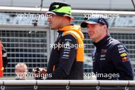 Lando Norris (GBR) McLaren and Max Verstappen (NLD) Red Bull Racing on the drivers' parade. 07.07.2024. Formula 1 World Championship, Rd 12, British Grand Prix, Silverstone, England, Race Day.