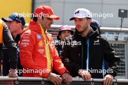 (L to R): Carlos Sainz Jr (ESP) Ferrari and Pierre Gasly (FRA) Alpine F1 Team on the drivers' parade. 07.07.2024. Formula 1 World Championship, Rd 12, British Grand Prix, Silverstone, England, Race Day.