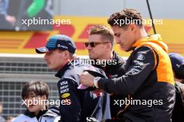(L to R): Max Verstappen (NLD) Red Bull Racing and Lando Norris (GBR) McLaren on the drivers' parade. 07.07.2024. Formula 1 World Championship, Rd 12, British Grand Prix, Silverstone, England, Race Day.
