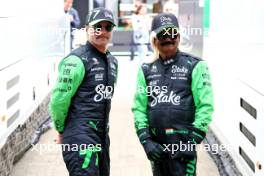 (L to R): Valtteri Bottas (FIN) Sauber with Just Sul (IND) Comedian.  04.07.2024. Formula 1 World Championship, Rd 12, British Grand Prix, Silverstone, England, Preparation Day.