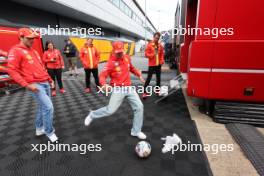 (L to R): Carlos Sainz Jr (ESP) Ferrari and Charles Leclerc (MON) Ferrari. 04.07.2024. Formula 1 World Championship, Rd 12, British Grand Prix, Silverstone, England, Preparation Day.