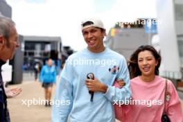 (L to R): Alexander Albon (THA) Williams Racing with his girlfriend Muni Lily He (CHN) Professional Golfer. 04.07.2024. Formula 1 World Championship, Rd 12, British Grand Prix, Silverstone, England, Preparation Day.