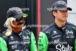 (L to R): Just Sul (IND) Comedian with Zhou Guanyu (CHN) Sauber. 04.07.2024. Formula 1 World Championship, Rd 12, British Grand Prix, Silverstone, England, Preparation Day.