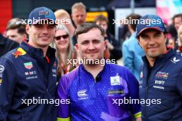 (L to R): Max Verstappen (NLD) Red Bull Racing with Luke Littler (GBR) Darts Player and Sergio Perez (MEX) Red Bull Racing. 04.07.2024. Formula 1 World Championship, Rd 12, British Grand Prix, Silverstone, England, Preparation Day.