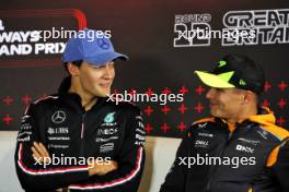 (L to R): George Russell (GBR) Mercedes AMG F1 and Lando Norris (GBR) McLaren in the FIA Press Conference. 04.07.2024. Formula 1 World Championship, Rd 12, British Grand Prix, Silverstone, England, Preparation Day.