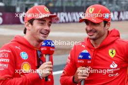 (L to R): Charles Leclerc (MON) Ferrari with Carlos Sainz Jr (ESP) Ferrari. 04.07.2024. Formula 1 World Championship, Rd 12, British Grand Prix, Silverstone, England, Preparation Day.