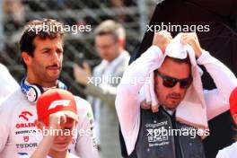 Fernando Alonso (ESP) Aston Martin F1 Team and Daniel Ricciardo (AUS) RB on the grid. 21.07.2024. Formula 1 World Championship, Rd 13, Hungarian Grand Prix, Budapest, Hungary, Race Day.